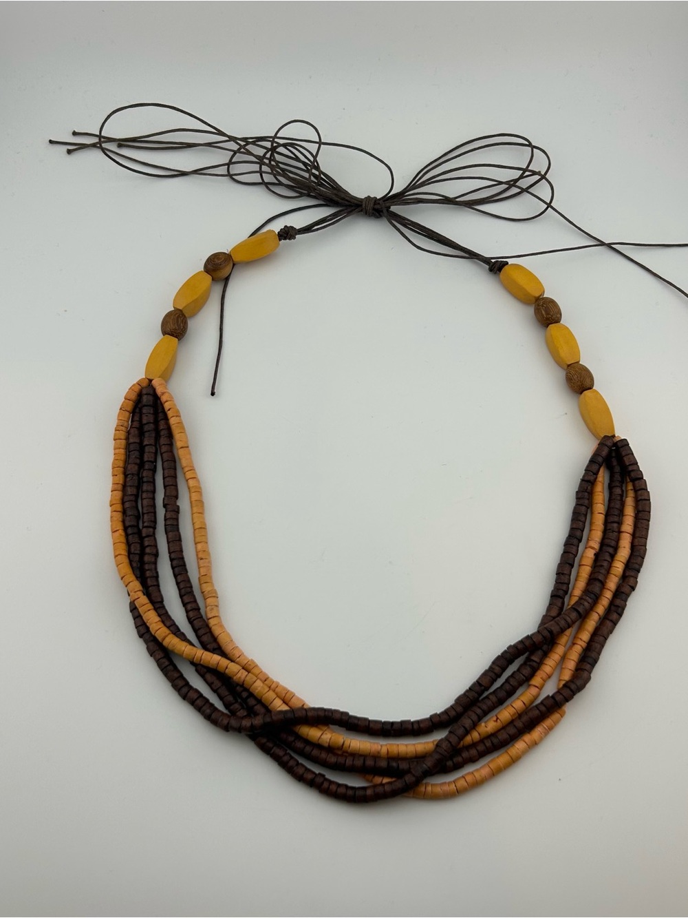 Bohemian Multi Strand Wooden Bead Necklace Adjustable Cord Brown Tan Tribal Boho